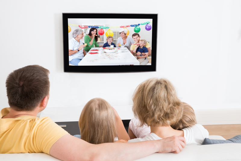 Family zoom on TV